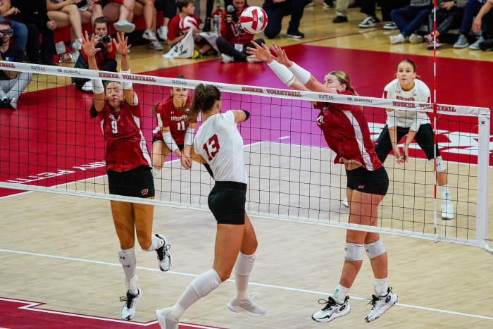 Oct 21, 2023; Lincoln, NE, USA; Wisconsin Badgers outside hitter Sarah Franklin (13) blocks Nebraska Cornhuskers outside hitter Merritt Beason (13) during the second set at the Bob Devaney Sports Center. Mandatory Credit: Dylan Widger-USA TODAY Sports
